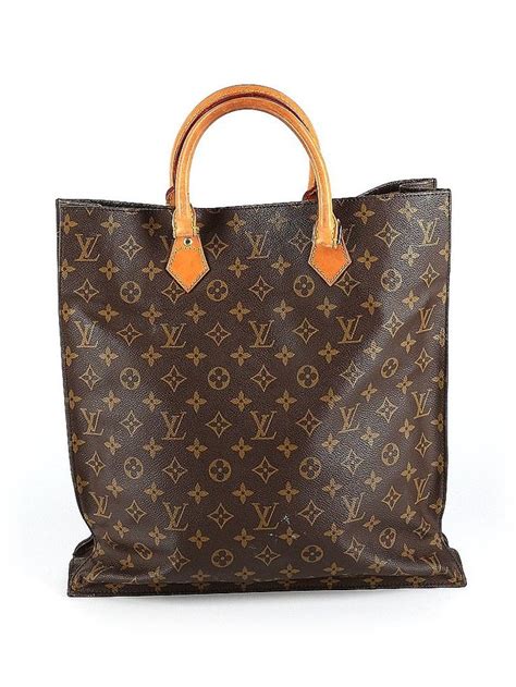 louis vuitton solid brown bag.